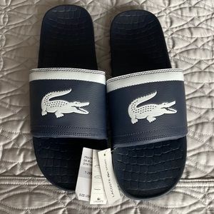 Men’s navy blue Lacoste never worn tags on slides size 12